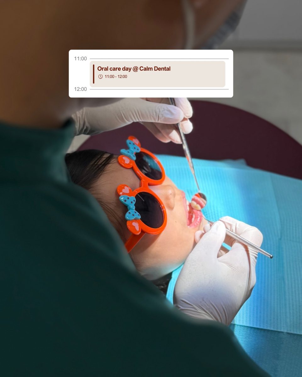 A child being examined at Calm Dental, wearing protective glasses