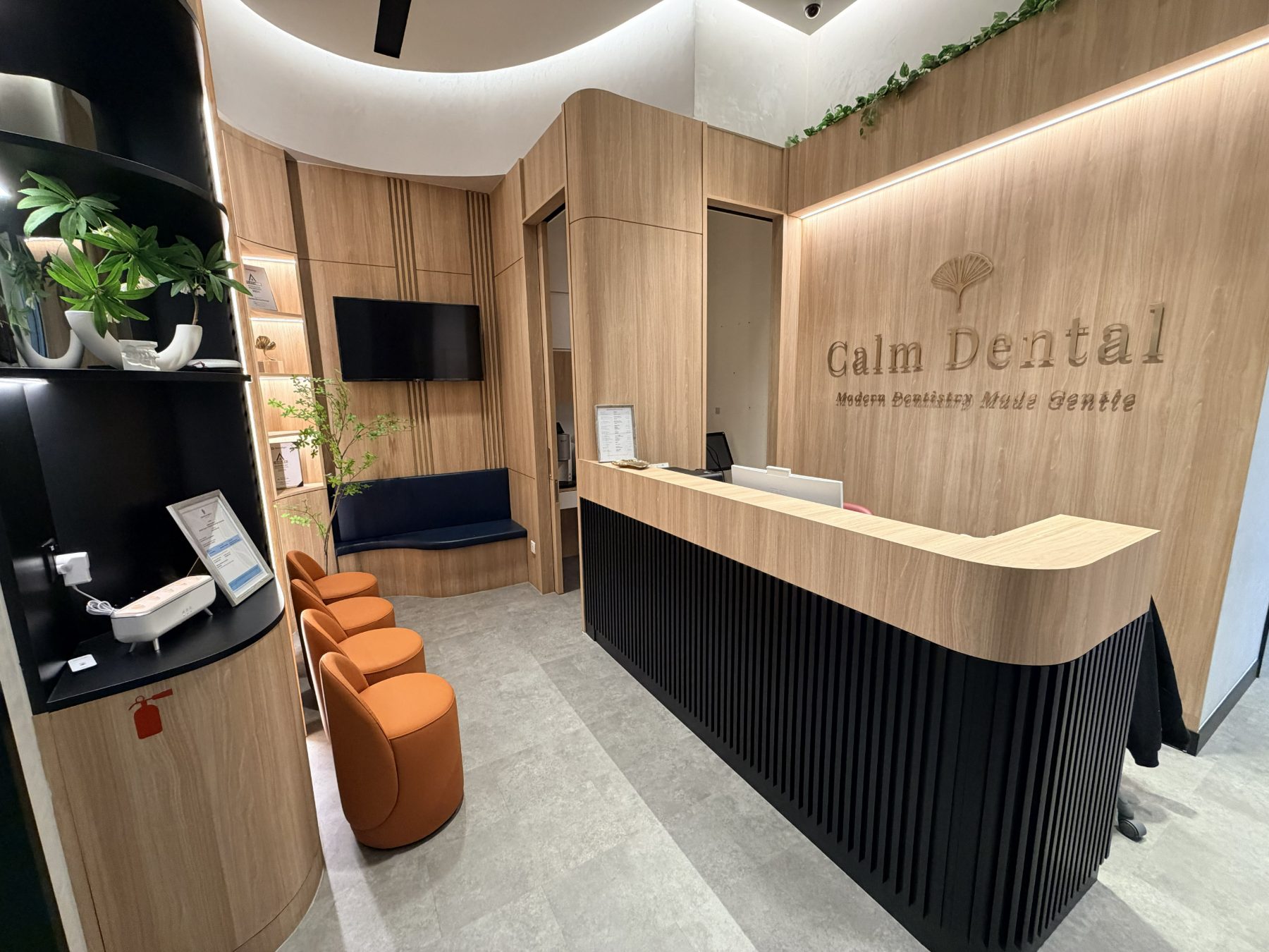 The reception and waiting area at Calm Dental, Millenia Walk